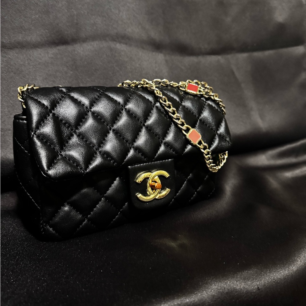 Black and Gold Crossbody Bag with Quilted Design